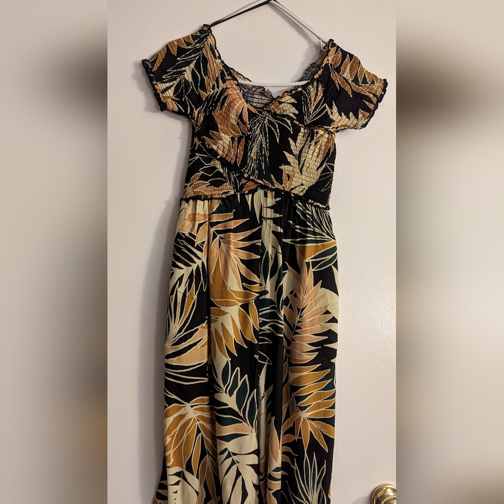 New tropical colored one piece pantsuit. Size small.